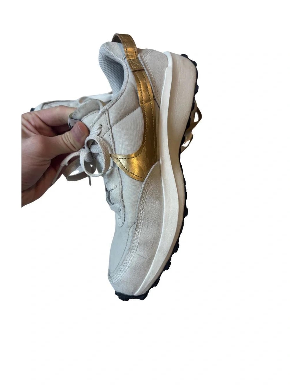 Nike Waffle Debut sneakers in a light orewood brown and metallic gold colorway